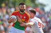 23 June 2018; Shane Redmond of Carlow in action against Declan McClure of Tyrone during the GAA Football All-Ireland Senior Championship Round 2 match between Carlow and Tyrone at Netwatch Cullen Park in Carlow. Photo by Matt Browne/Sportsfile