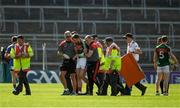 23 June 2018; Seamus O'Shea of Mayo is assisted off the pitch after picking up an injury during the GAA Football All-Ireland Senior Championship Round 2 match between Tipperary and Mayo at Semple Stadium in Thurles, Tipperary. Photo by Ray McManus/Sportsfile