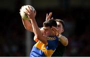 23 June 2018; Michael Quinlivan of Tipperary in action against Paddy Durcan of Mayo during the GAA Football All-Ireland Senior Championship Round 2 match between Tipperary and Mayo at Semple Stadium in Thurles, Tipperary. Photo by Ray McManus/Sportsfile