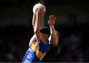 23 June 2018; Michael Quinlivan of Tipperary in action against Paddy Durcan of Mayo during the GAA Football All-Ireland Senior Championship Round 2 match between Tipperary and Mayo at Semple Stadium in Thurles, Tipperary. Photo by Ray McManus/Sportsfile