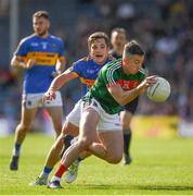 23 June 2018; Evan Regan of Mayo in action against Robbie Kiely of Tipperary during the GAA Football All-Ireland Senior Championship Round 2 match between Tipperary and Mayo at Semple Stadium in Thurles, Tipperary. Photo by Ray McManus/Sportsfile