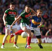 23 June 2018; Andy Moran of Mayo in action against Brian Fox of Tipperary during the GAA Football All-Ireland Senior Championship Round 2 match between Tipperary and Mayo at Semple Stadium in Thurles, Tipperary. Photo by Ray McManus/Sportsfile