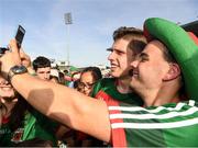 23 June 2018; Lee Keegan of Mayo poses for a photo with a Mayo supporter after the GAA Football All-Ireland Senior Championship Round 2 match between Tipperary and Mayo at Semple Stadium in Thurles, Tipperary. Photo by Ray McManus/Sportsfile