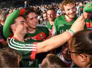 23 June 2018; Lee Keegan of Mayo poses for a photo with a Mayo supporter after the GAA Football All-Ireland Senior Championship Round 2 match between Tipperary and Mayo at Semple Stadium in Thurles, Tipperary. Photo by Ray McManus/Sportsfile