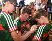 23 June 2018; Eoin O'Donoghue of Mayo signs jerseys for supporters after during the GAA Football All-Ireland Senior Championship Round 2 match between Tipperary and Mayo at Semple Stadium in Thurles, Tipperary. Photo by Ray McManus/Sportsfile