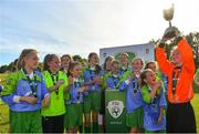 23 June 2018; Addison Emma Daughtry of Metropolitan Girls League lifts the trophy after the U12's Finals match between Metropolitan Girls League and Sligo/Leitrim League on the Saturday of the Fota Island Resort Gaynor Tournament at the University of Limerick in Limerick. Photo by Harry Murphy/Sportsfile