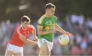 23 June 2018; Darragh Rooney of Leitrim in action against Emmet Carolan of Louth during the GAA Football All-Ireland Senior Championship Round 2 match between Leitrim and Louth at Páirc Seán Mac Diarmada in Carrick-on-Shannon, Co. Leitrim. Photo by Ramsey Cardy/Sportsfile