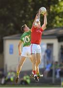 23 June 2018; Bevan Duffy of Louth in action against Darragh Rooney of Leitrim during the GAA Football All-Ireland Senior Championship Round 2 match between Leitrim and Louth at Páirc Seán Mac Diarmada in Carrick-on-Shannon, Co. Leitrim. Photo by Ramsey Cardy/Sportsfile