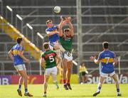 23 June 2018; John Meagher of Tipperary and Aidan O'Shea of Mayo jump highest in an effort to win possession during the GAA Football All-Ireland Senior Championship Round 2 match between Tipperary and Mayo at Semple Stadium in Thurles, Tipperary. Photo by Ray McManus/Sportsfile