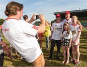 23 June 2018; Mark Morris from Dungannon takes a picture of his kids Jean-Luc Morris age 15 , Maggie-Sue age 9 and Eva-May age 11, with Tyrone manager Mickey Harte after the GAA Football All-Ireland Senior Championship Round 2 match between Carlow and Tyrone at Netwatch Cullen Park in Carlow. Photo by Matt Browne/Sportsfile