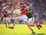 23 June 2018; Sam Ryan of Cork in action against Seán O’Shea of Kerry during the Munster GAA Football Senior Championship Final match between Cork and Kerry at Páirc Ui Chaoimh in Cork. Photo by Stephen McCarthy/Sportsfile