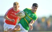 23 June 2018; Emlyn Mulligan of Leitrim in action against Gerard McSorley of Louth during the GAA Football All-Ireland Senior Championship Round 2 match between Leitrim and Louth at Páirc Seán Mac Diarmada in Carrick-on-Shannon, Co. Leitrim. Photo by Ramsey Cardy/Sportsfile