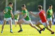 23 June 2018; Ryan O'Rourke of Leitrim in action against Anthony Williams of Louth during the GAA Football All-Ireland Senior Championship Round 2 match between Leitrim and Louth at Páirc Seán Mac Diarmada in Carrick-on-Shannon, Co. Leitrim. Photo by Ramsey Cardy/Sportsfile