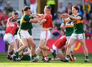 23 June 2018; Sean White of Cork and Jack Barry of Kerry tussle during the Munster GAA Football Senior Championship Final match between Cork and Kerry at Páirc Ui Chaoimh in Cork. Photo by Stephen McCarthy/Sportsfile
