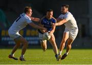 23 June 2018; Donal McElligott of Longford is tackled by Paul Cribbin, left, and Fergal Conway of Kildare during the GAA Football All-Ireland Senior Championship Round 2 match between Longford and Kildare at Glennon Brothers Pearse Park in Longford. Photo by Piaras Ó Mídheach/Sportsfile