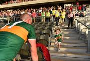 23 June 2018; Kerry’s Kieran Donaghy's  daughter Lola Rose joins him on the pitch following the Munster GAA Football Senior Championship Final match between Cork and Kerry at Páirc Ui Chaoimh in Cork. Photo by Eóin Noonan/Sportsfile