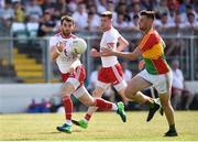 23 June 2018; Ronan McNamee of Tyrone in action against Eoghan Ruth of Carlow during the GAA Football All-Ireland Senior Championship Round 2 match between Carlow and Tyrone at Netwatch Cullen Park in Carlow. Photo by Matt Browne/Sportsfile