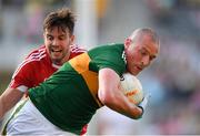 23 June 2018; Kieran Donaghy of Kerry is tackled by Jamie O'Sullivan of Cork during the Munster GAA Football Senior Championship Final match between Cork and Kerry at Páirc Ui Chaoimh in Cork. Photo by Eóin Noonan/Sportsfile