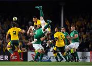23 June 2018; Peter O’Mahony of Ireland is tackled in the air by Israel Folau of Australia during the 2018 Mitsubishi Estate Ireland Series 3rd Test match between Australia and Ireland at Allianz Stadium in Sydney, Australia. Photo by Brendan Moran/Sportsfile