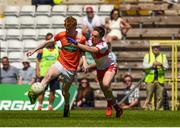 24 June 2018; Conor Turbitt of Armagh in action against Conor McCluskey of Derry during the EirGrid Ulster GAA Football U20 Championship Final match between Armagh and Derry at St Tiernach's Park in Clones, Monaghan. Photo by Philip Fitzpatrick/Sportsfile