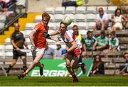 24 June 2018; Conor Turbitt of Armagh in action against Conor McCluskey of Derry during the EirGrid Ulster GAA Football U20 Championship Final match between Armagh and Derry at St Tiernach's Park in Clones, Monaghan. Photo by Philip Fitzpatrick/Sportsfile