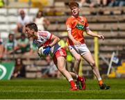 24 June 2018; Conor McCluskey of Derry in action against Conor Turbitt of Armagh during the EirGrid Ulster GAA Football U20 Championship Final match between Armagh and Derry at St Tiernach's Park in Clones, Monaghan. Photo by Philip Fitzpatrick/Sportsfile