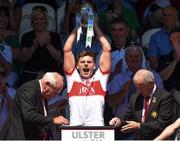 24 June 2018; Derry captain Conor Doherty lifting the Donal O Murchu Cup following his side's victory in the EirGrid Ulster GAA Football U20 Championship Final match between Armagh and Derry at St Tiernach's Park in Clones, Monaghan. Photo by Philip Fitzpatrick/Sportsfile