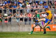 24 June 2018; Pearse Lillis of Clare shoots under pressure from Niall Darby of Offaly during the GAA Football All-Ireland Senior Championship Round 2 match between Offaly and Clare at Bord Na Mona O’Connor Park in Tullamore, Offaly. Photo by Harry Murphy/Sportsfile