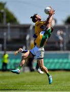 24 June 2018; Cian O'Dea of Clare in action against Cian Donohue of Offaly during the GAA Football All-Ireland Senior Championship Round 2 match between Offaly and Clare at Bord Na Mona O’Connor Park in Tullamore, Offaly. Photo by Harry Murphy/Sportsfile