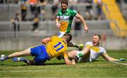 24 June 2018; Eoin Cleary of Clare in action against Alan Mulhall of Offaly during the GAA Football All-Ireland Senior Championship Round 2 match between Offaly and Clare at Bord Na Mona O’Connor Park in Tullamore, Offaly. Photo by Harry Murphy/Sportsfile