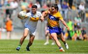 24 June 2018; Ruairí McNamee of Offaly in action against Cian O'Dea of Clare during the GAA Football All-Ireland Senior Championship Round 2 match between Offaly and Clare at Bord Na Mona O’Connor Park in Tullamore, Offaly. Photo by Harry Murphy/Sportsfile