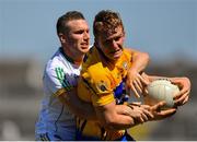 24 June 2018; Pearse Lillis of Clare in action against Anton Sullivan of Offaly during the GAA Football All-Ireland Senior Championship Round 2 match between Offaly and Clare at Bord Na Mona O’Connor Park in Tullamore, Offaly. Photo by Harry Murphy/Sportsfile
