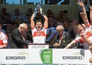24 June 2018; Conor Doherty of Derry is presented with the Corn Donall O'Murchu EirGrid Ulster GAA Football U20 Championship Cup after the EirGrid Ulster GAA Football U20 Championship Final match between Armagh and Derry at St Tiernach's Park in Clones, Monaghan. Photo by Oliver McVeigh/Sportsfile