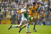 24 June 2018; Declan McCusker of Fermanagh in action against Michael Langan of Donegal during the Ulster GAA Football Senior Championship Final match between Donegal and Fermanagh at St Tiernach's Park in Clones, Monaghan. Photo by Philip Fitzpatrick/Sportsfile