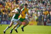 24 June 2018; Declan McCusker of Fermanagh in action against Michael Langan of Donegal during the Ulster GAA Football Senior Championship Final match between Donegal and Fermanagh at St Tiernach's Park in Clones, Monaghan. Photo by Philip Fitzpatrick/Sportsfile