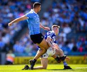 24 June 2018; James McCarthy of Dublin has his shot blocked by Trevor Collins of Laois during the Leinster GAA Football Senior Championship Final match between Dublin and Laois at Croke Park in Dublin. Photo by Stephen McCarthy/Sportsfile