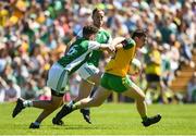 24 June 2018; Jamie Brennan of Donegal  in action against James McMahon of Fermanagh  during the Ulster GAA Football Senior Championship Final match between Donegal and Fermanagh at St Tiernach's Park in Clones, Monaghan. Photo by Oliver McVeigh/Sportsfile