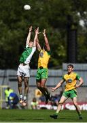 24 June 2018; Che Cullen of Fermanagh in action against Michael Murphy of Donegal during the Ulster GAA Football Senior Championship Final match between Donegal and Fermanagh at St Tiernach's Park in Clones, Monaghan. Photo by Ramsey Cardy/Sportsfile