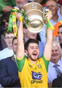 24 June 2018; Ryan McHugh of Donegal lifts the trophy following the Ulster GAA Football Senior Championship Final match between Donegal and Fermanagh at St Tiernach's Park in Clones, Monaghan. Photo by Ramsey Cardy/Sportsfile