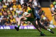 24 June 2018; Jamie Brennan of Donegal is tackled by James McMahon of Fermanagh during the Ulster GAA Football Senior Championship Final match between Donegal and Fermanagh at St Tiernach's Park in Clones, Monaghan. Photo by Ramsey Cardy/Sportsfile