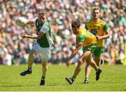 24 June 2018; Aidan Breen of Fermanagh in action against Odhran MacNiallais of Donegal during the Ulster GAA Football Senior Championship Final match between Donegal and Fermanagh at St Tiernach's Park in Clones, Monaghan. Photo by Oliver McVeigh/Sportsfile