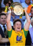 24 June 2018; Darrach O'Connor of Donegal lifts the trophy following the Ulster GAA Football Senior Championship Final match between Donegal and Fermanagh at St Tiernach's Park in Clones, Monaghan. Photo by Ramsey Cardy/Sportsfile