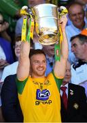 24 June 2018; Eamonn Doherty of Donegal lifts the trophy following the Ulster GAA Football Senior Championship Final match between Donegal and Fermanagh at St Tiernach's Park in Clones, Monaghan. Photo by Ramsey Cardy/Sportsfile