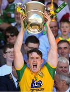 24 June 2018; Hugh McFadden of Donegal lifts the trophy following the Ulster GAA Football Senior Championship Final match between Donegal and Fermanagh at St Tiernach's Park in Clones, Monaghan. Photo by Ramsey Cardy/Sportsfile