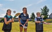 27 June 2018; Ali Twomey of Dublin, with Alana Lennon, aged 9, left, and Alex Judge, aged 10, both from St Michaels, Ballyfermot, all were in Ballyfermot Sports Complex today at the AIG Heroes event, an initiative which helps support local grassroots communities by partnering with Dublin GAA and others to use sport as a means to build self-confidence and social skills in young kids. To further promote these efforts AIG Insurance gifted GAA equipment to primary schools in the area. Photo by Sam Barnes/Sportsfile