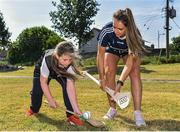27 June 2018; Ali Twomey of Dublin and Alex Judge, aged 10, from St Michaels, Ballyfermot, were in Ballyfermot Sports Complex today at the AIG Heroes event, an initiative which helps support local grassroots communities by partnering with Dublin GAA and others to use sport as a means to build self-confidence and social skills in young kids. To further promote these efforts AIG Insurance gifted GAA equipment to primary schools in the area. Photo by Sam Barnes/Sportsfile