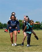 27 June 2018; Ali Twomey of Dublin, left, along with from left, Alex Judge, aged 10, Alana Lennon, aged 9, both from St Michaels, Ballyfermot, and Sophie Callaghan, aged 11, from St Raphaels, Ballyfermot, all were in Ballyfermot Sports Complex today at the AIG Heroes event, an initiative which helps support local grassroots communities by partnering with Dublin GAA and others to use sport as a means to build self-confidence and social skills in young kids. To further promote these efforts AIG Insurance gifted GAA equipment to primary schools in the area. Photo by Sam Barnes/Sportsfile
