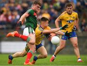 17 June 2018; Jordan Flynn of Mayo in action against Aidan Dowd of Roscommon during the EirGrid Connacht GAA Football U20 Championship Final match between Mayo and Roscommon at Dr Hyde Park in Roscommon. Photo by Piaras Ó Mídheach/Sportsfile