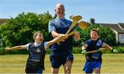 27 June 2018; Fergal Whitely of Dublin, centre, along with Michael Gaffney, aged 9, left, from St Gabriels, Ballyfermot, and Jake O'Connor, age 10, from Mary Queen of Angels, Ballyfermot, all were in Ballyfermot Sports Complex today at the AIG Heroes event, an initiative which helps support local grassroots communities by partnering with Dublin GAA and others to use sport as a means to build self-confidence and social skills in young kids. To further promote these efforts AIG Insurance gifted GAA equipment to primary schools in the area. Photo by Sam Barnes/Sportsfile