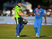 27 June 2018; Peter Chase of Ireland and Jasprit Bumrah of India shake hands following the T20 International match between Ireland and India at Malahide Cricket Club Ground in Dublin. Photo by Seb Daly/Sportsfile
